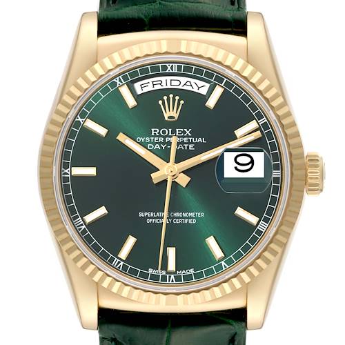 This image shows a front view of the Rolex President 118138 Men's Yellow Gold Green Dial 118138 Men's Yellow Gold Green Dial model watch, highlighting its green dial, gold indices, and fluted bezel.