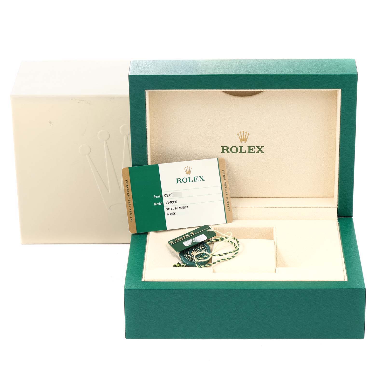The image shows the open box for a Rolex Submariner 114060 Men's Stainless Steel Black Dial 114060 Men's Stainless Steel Black Dial watch, displaying the warranty card and accessories inside the box.