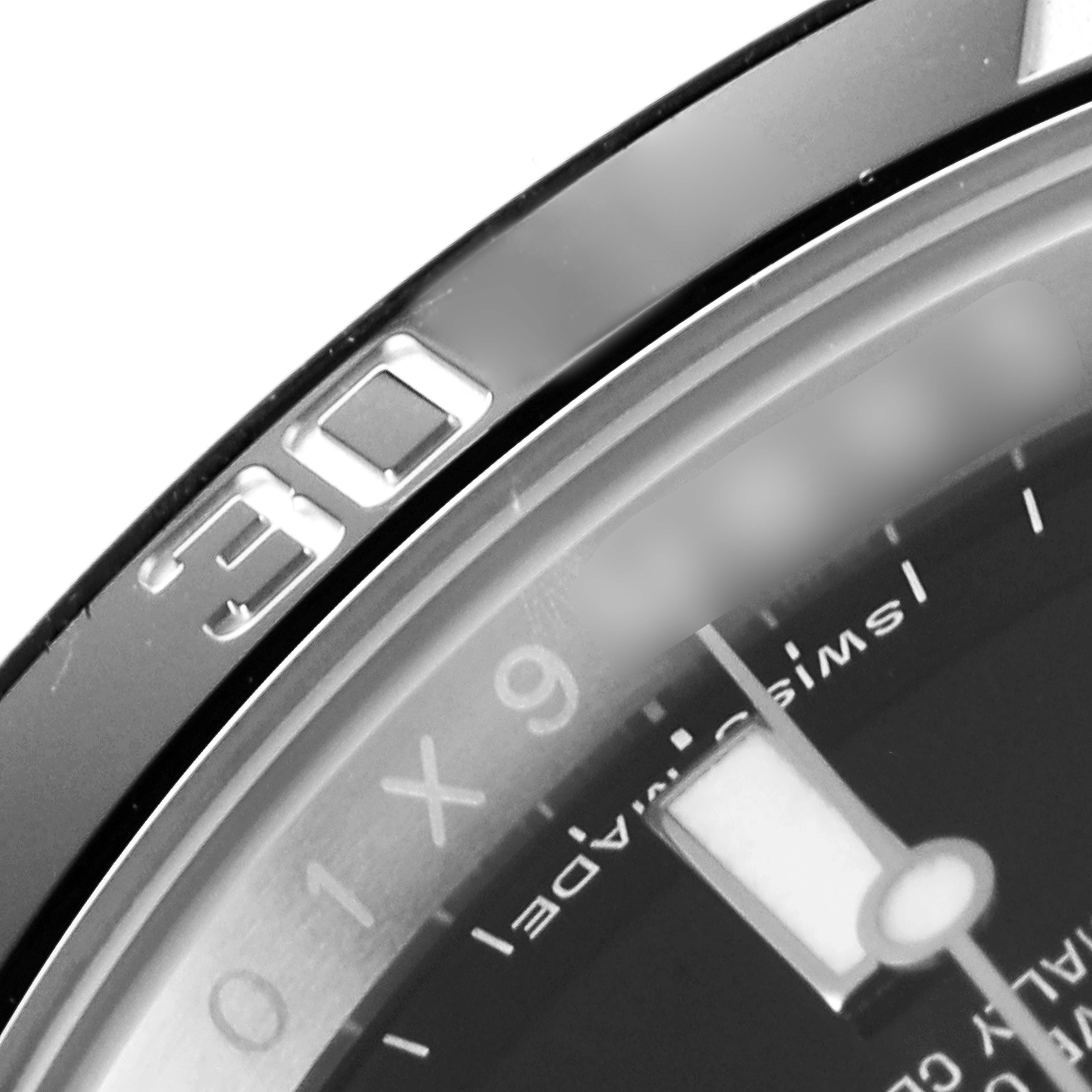 This image shows a partial close-up of the bezel and dial of a Rolex Submariner 114060 Men's Stainless Steel Black Dial 114060 Men's Stainless Steel Black Dial watch, highlighting the "30" marker and part of the minute scale.