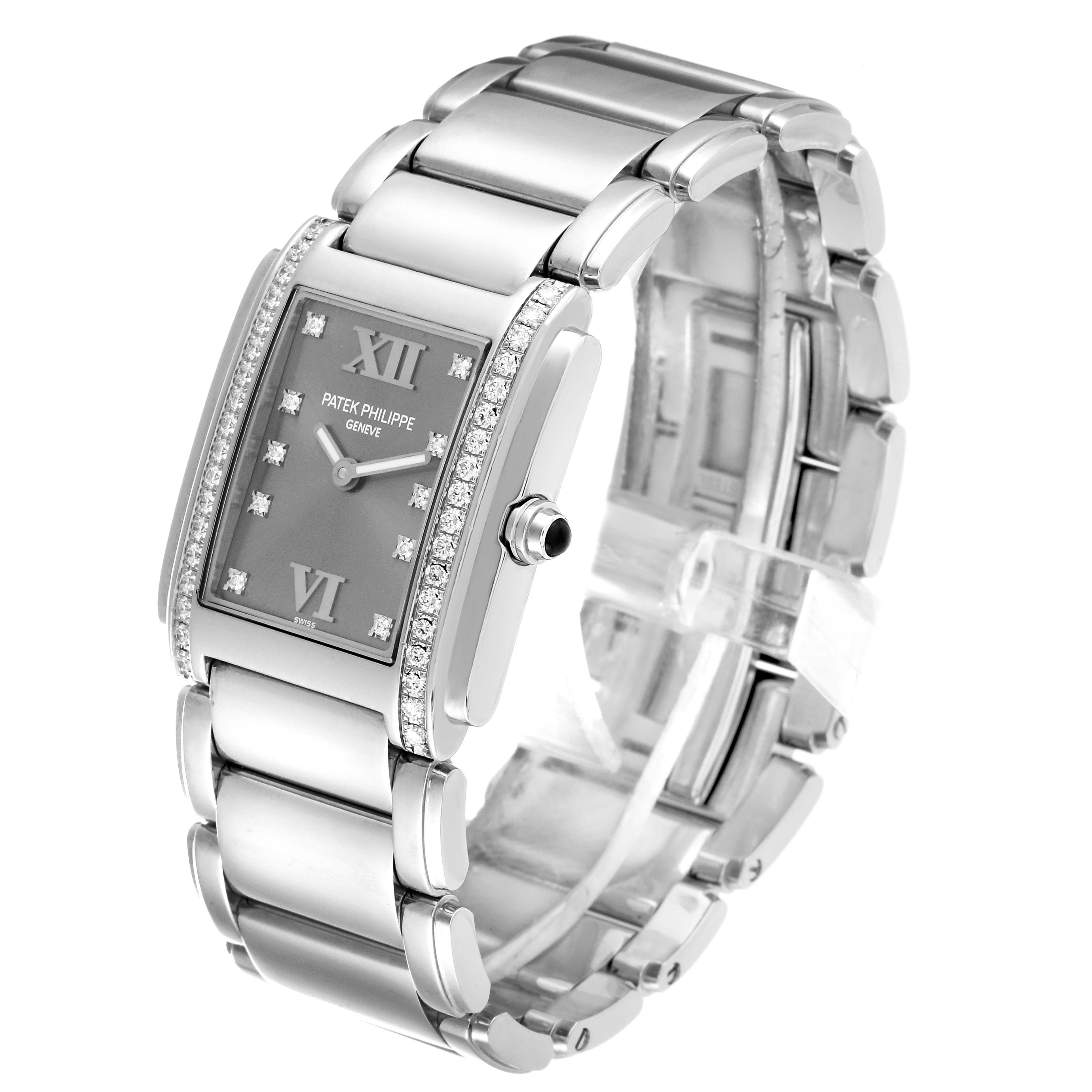 This image shows a Patek Philippe Twenty-4 4910/10 Women's Stainless Steel Grey Dial 4910/10 Women's Stainless Steel Grey Dial watch at a three-quarter angle, featuring the bracelet, dial, and bezel with diamond accents.