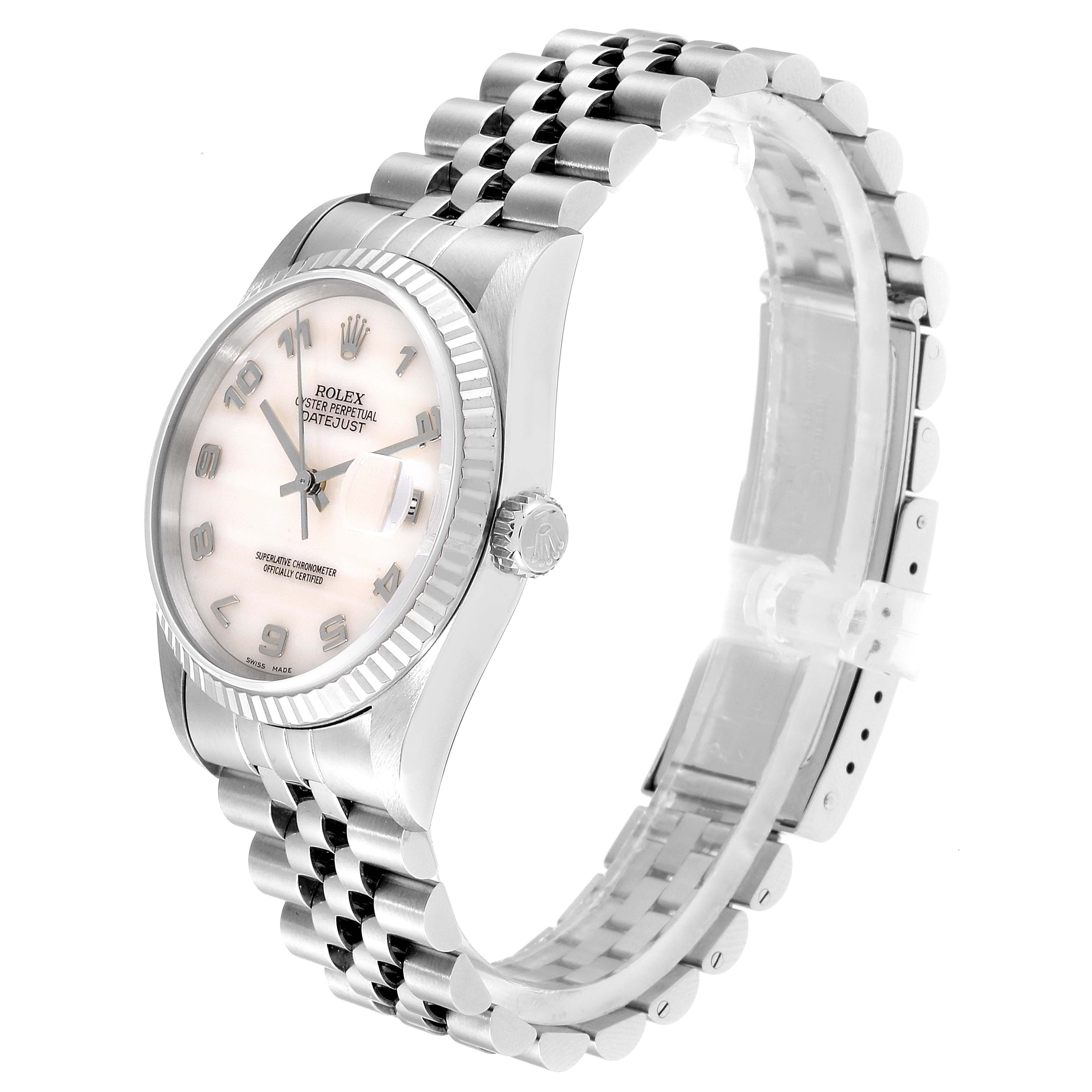 The Rolex Datejust 16234 Men's Stainless Steel Mother of Pearl Dial 16234 Men's Stainless Steel Mother of Pearl Dial watch is shown at a side angle displaying its face, crown, and jubilee bracelet.
