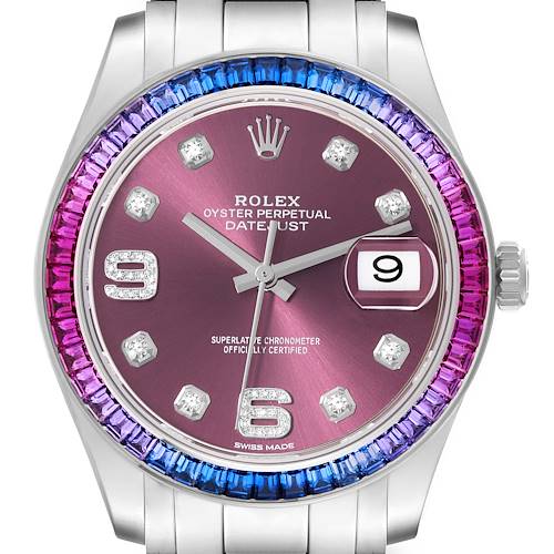 The image shows a frontal view of the Rolex Pearlmaster 86349SAFUBL Men's White Gold Purple Dial 86349SAFUBL Men's White Gold Purple Dial watch, showcasing its purple dial and a colorful gemstone-encrusted bezel.