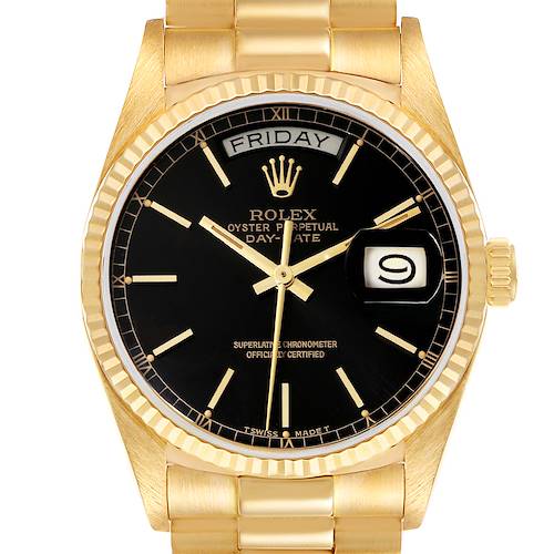 This is a front view of a Rolex President 18038 Men's Yellow Gold Black Dial 18038 Men's Yellow Gold Black Dial model watch showcasing the dial, day-date display, and part of the bracelet.