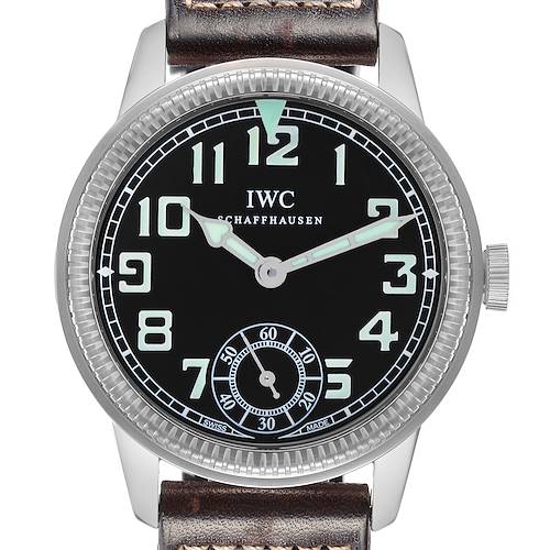 The IWC Pilot IW325401 Men's Platinum Black Dial model is shown from a front angle, displaying the watch face, hands, crown, and part of the leather strap.