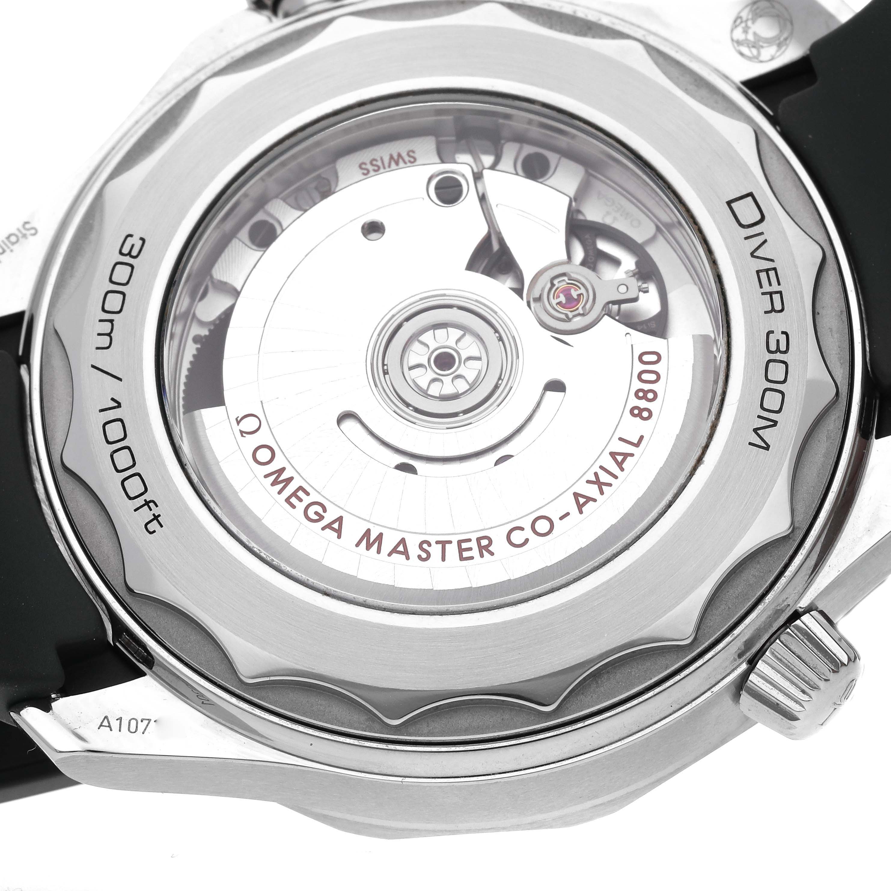 The image shows the caseback of the Omega Seamaster 210.32.42.20.10.001 Men's Stainless Steel Green Dial 210.32.42.20.10.001 Men's Stainless Steel Green Dial Diver 300M, highlighting the Omega Master Co-Axial 8800 movement.