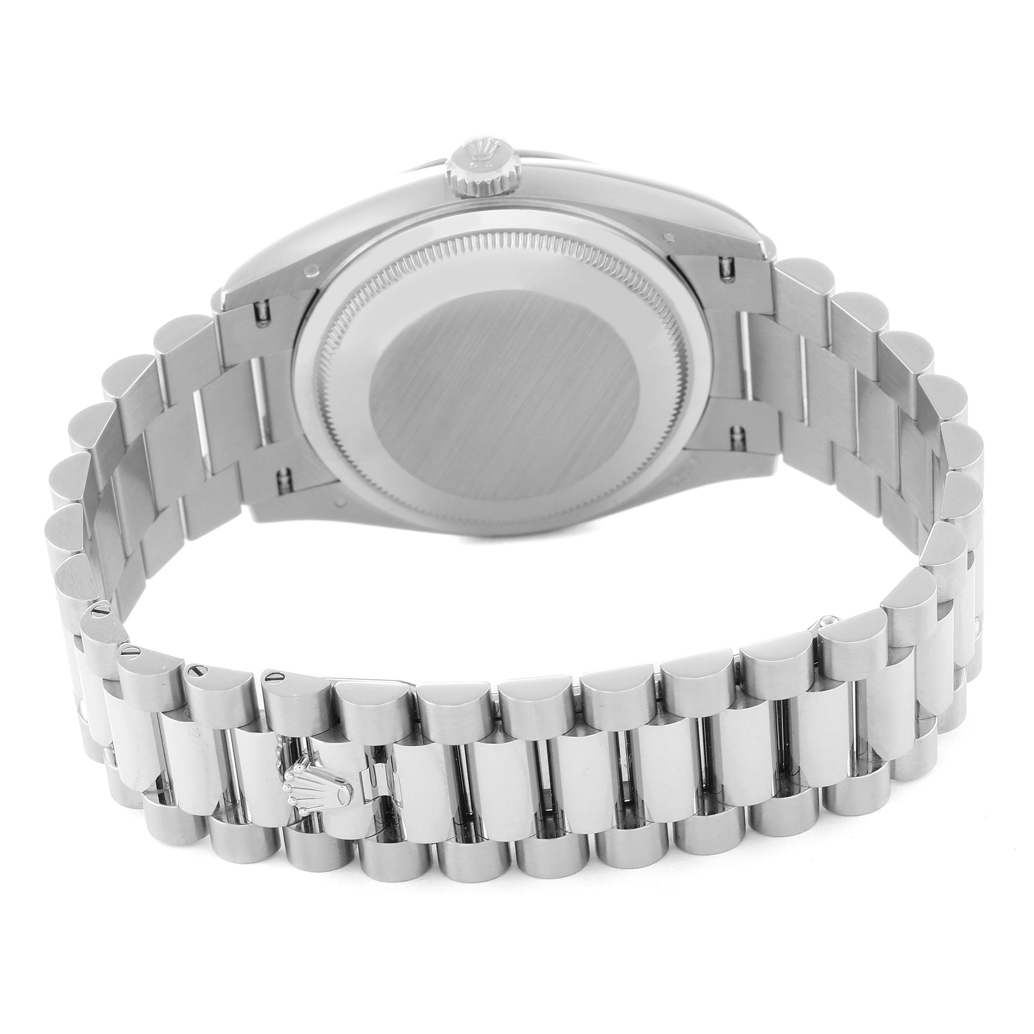 This image shows the back case and President bracelet of a Rolex President 128239 Men's White Gold Blue Dial 128239 Men's White Gold Blue Dial model watch.