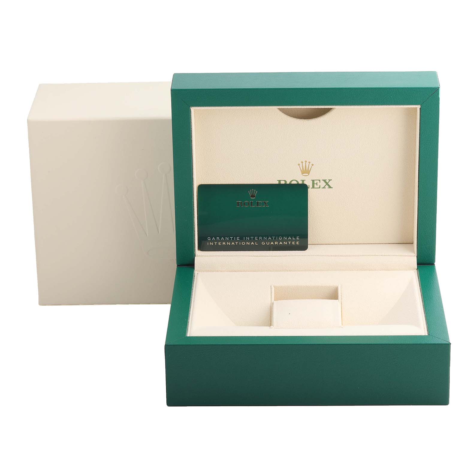 This image shows an open Rolex President 128239 Men's White Gold Blue Dial 128239 Men's White Gold Blue Dial model watch box, featuring the inner cushion and a warranty card.