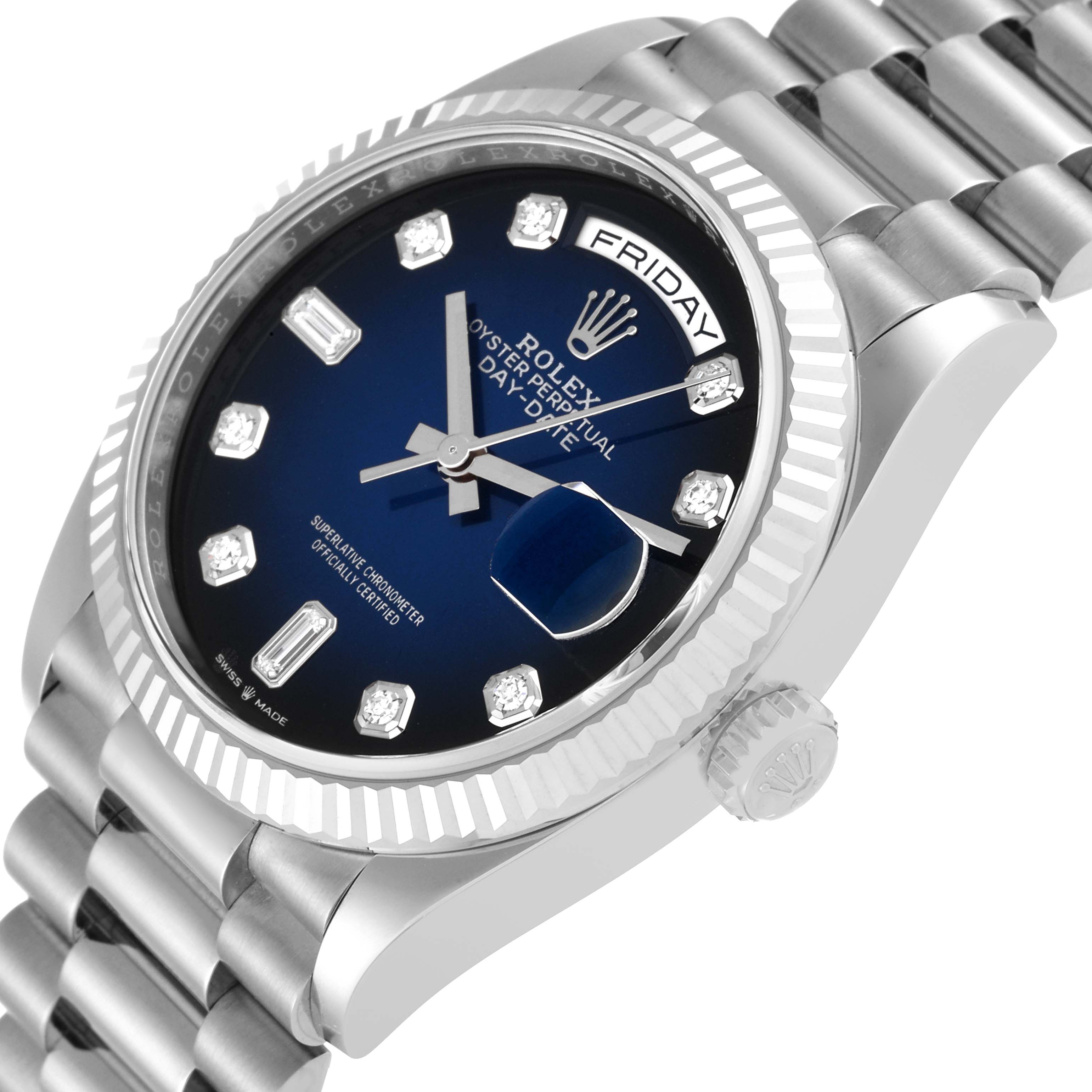 The image shows a side angle of the Rolex President 128239 Men's White Gold Blue Dial 128239 Men's White Gold Blue Dial model, highlighting the blue dial, day display, crown, and bracelet.