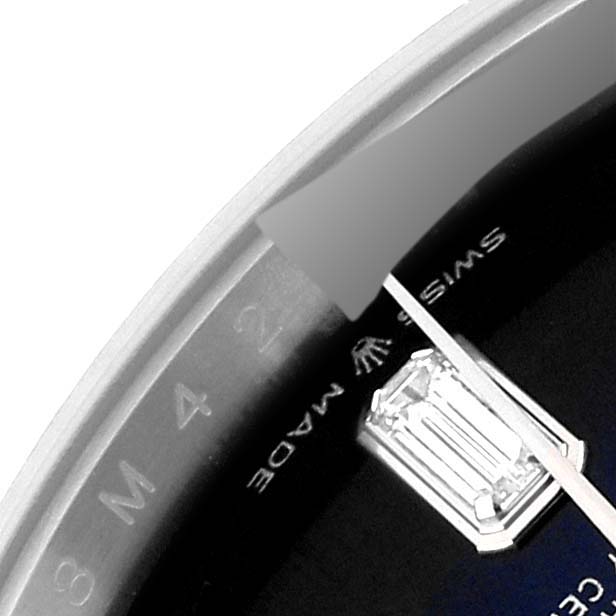 This close-up image shows partial dial details including diamonds and part of the bezel of the Rolex President 128239 Men's White Gold Blue Dial 128239 Men's White Gold Blue Dial model watch.