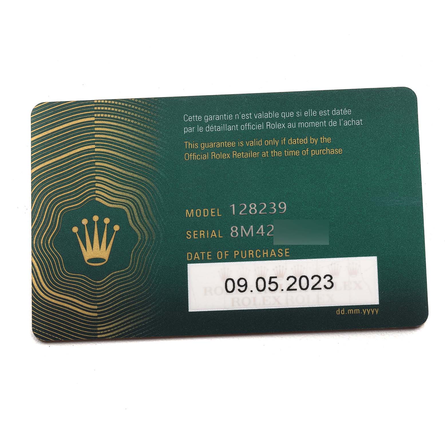 This image shows a Rolex warranty card for the President model with the serial number and date of purchase indicated.