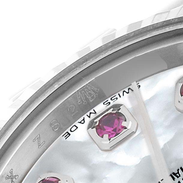 The close-up angle shows part of the dial, bezel, and 'SWISS MADE' text of a Rolex Datejust 179174 Women's Stainless Steel Mother of Pearl Dial 179174 Women's Stainless Steel Mother of Pearl Dial watch.