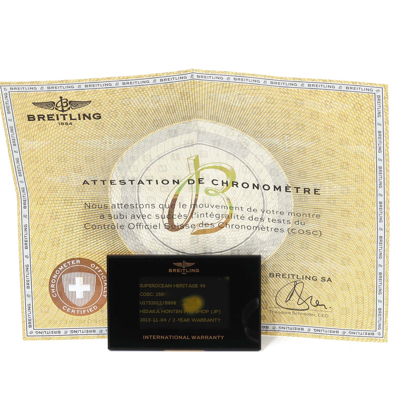 This image shows the warranty card and chronometer certificate for the Breitling Superocean U17320 Men's Stainless Steel Black Dial U17320 Men's Stainless Steel Black Dial model, viewed from the front.