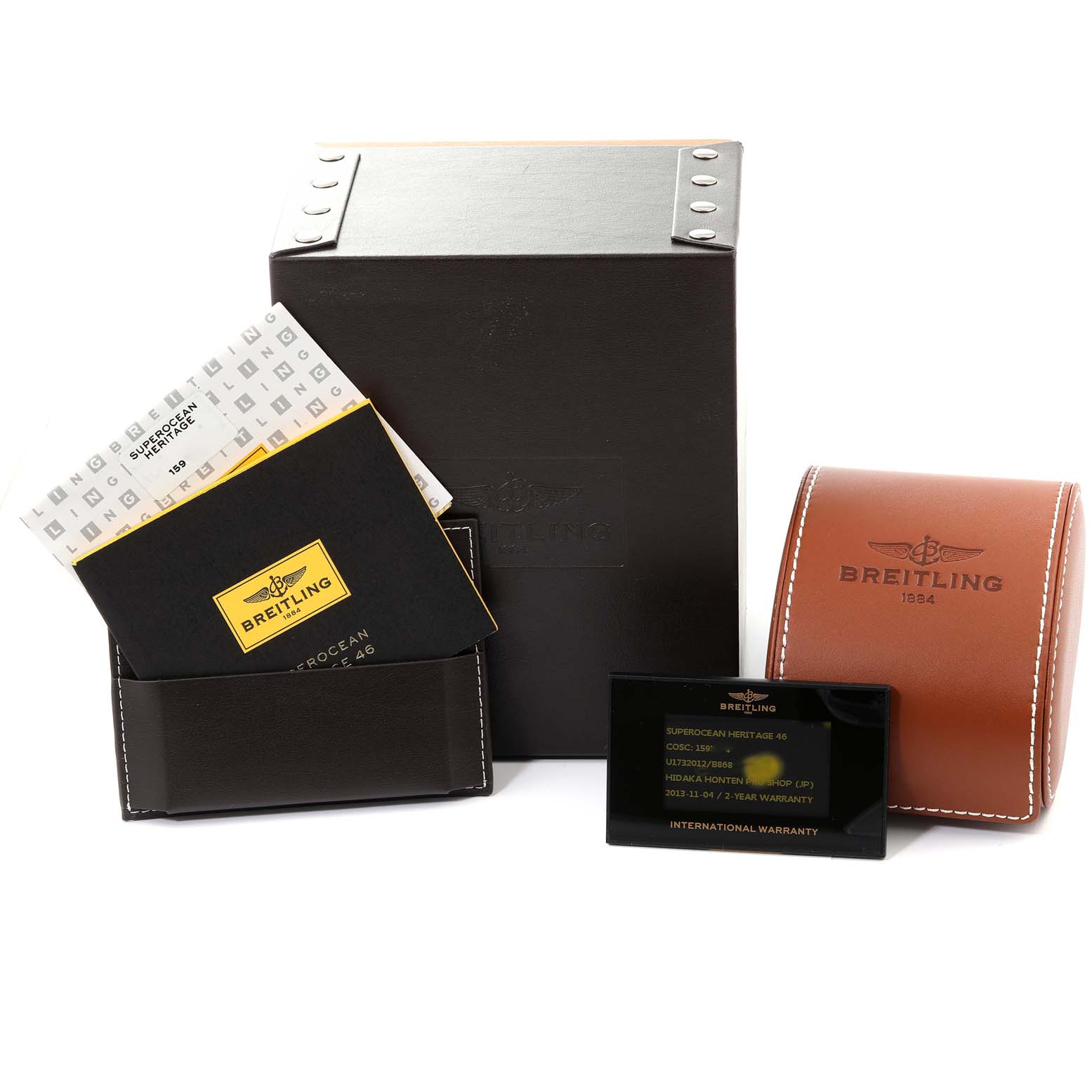 The image shows the packaging, manuals, and warranty card for a Breitling Superocean U17320 Men's Stainless Steel Black Dial U17320 Men's Stainless Steel Black Dial watch.