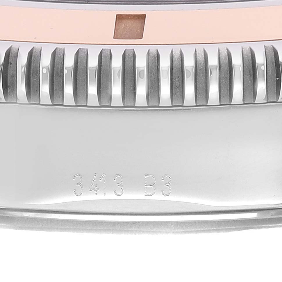 The image shows a close-up of the bezel and side casing of the Breitling Superocean U17320 Men's Stainless Steel Black Dial U17320 Men's Stainless Steel Black Dial watch, featuring serrated edges and engraved markings.