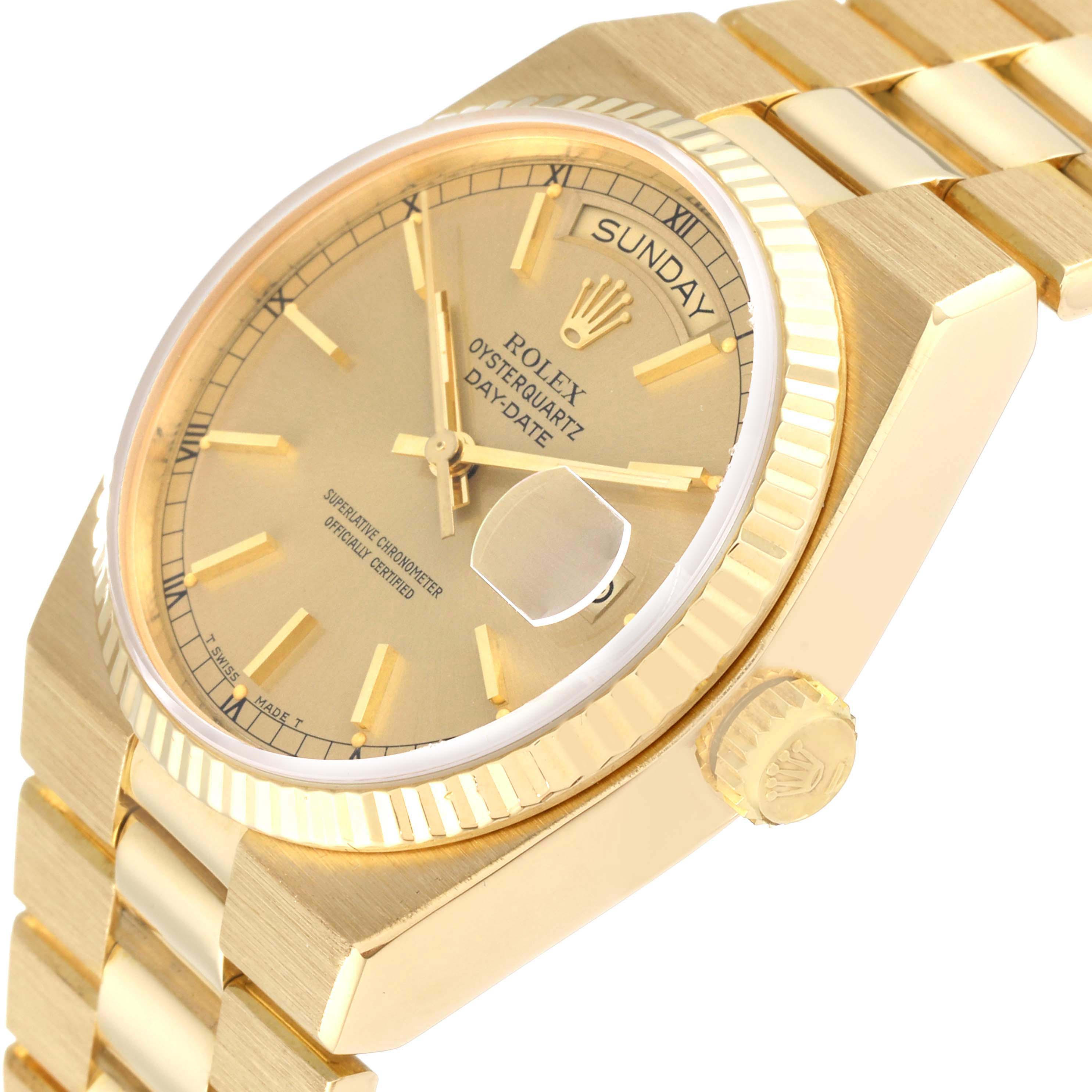 The photo shows a side angle of a Rolex Oysterquartz 19018 Men's Yellow Gold Champagne Dial 19018 Men's Yellow Gold Champagne Dial Day-Date watch, highlighting the dial, bezel, crown, and part of the bracelet.