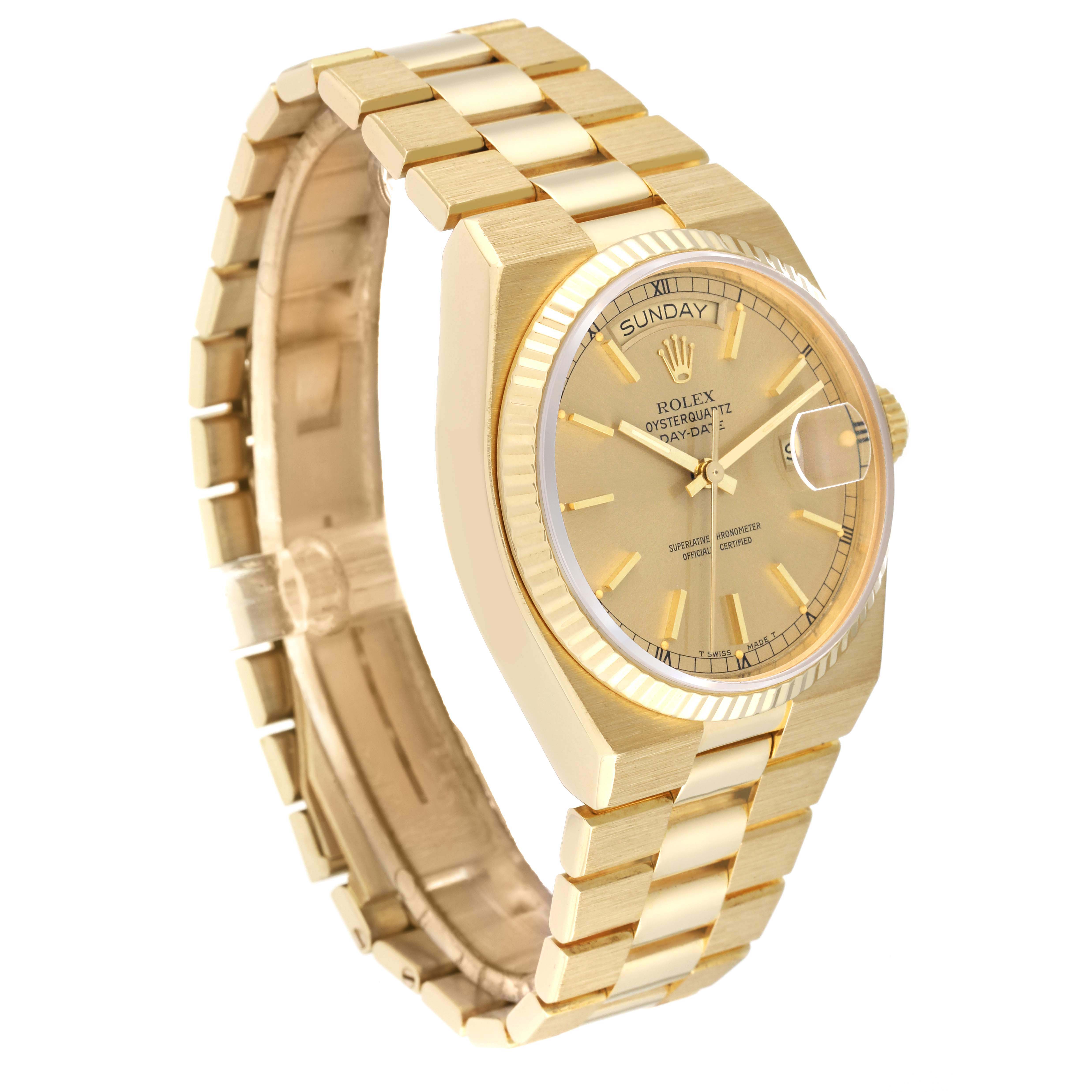 This image shows a side angle of the Rolex Oysterquartz 19018 Men's Yellow Gold Champagne Dial 19018 Men's Yellow Gold Champagne Dial watch, highlighting the gold bracelet, case, and champagne dial with day and date display.