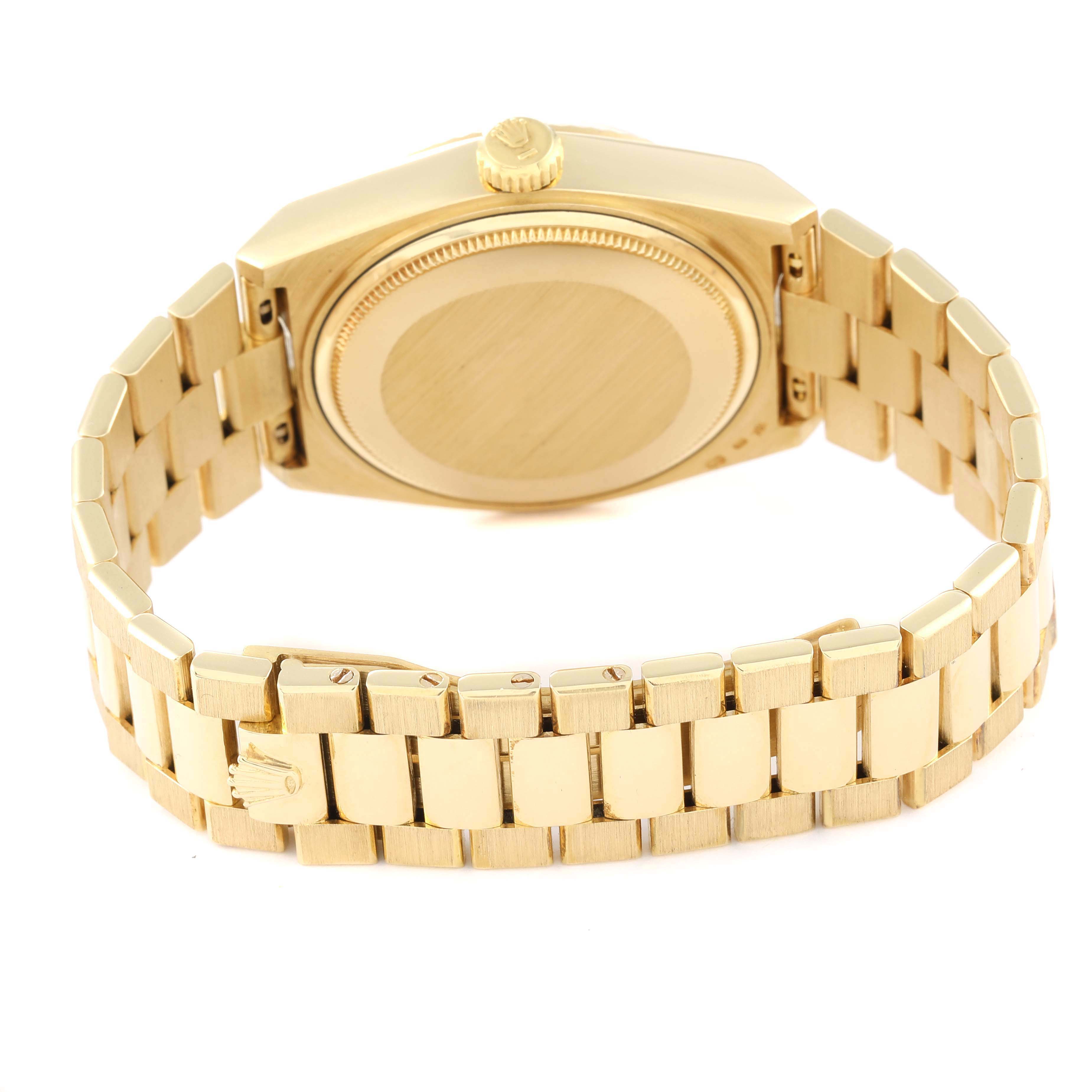 The image shows the back view of a Rolex Oysterquartz 19018 Men's Yellow Gold Champagne Dial 19018 Men's Yellow Gold Champagne Dial watch, highlighting its case back and bracelet.