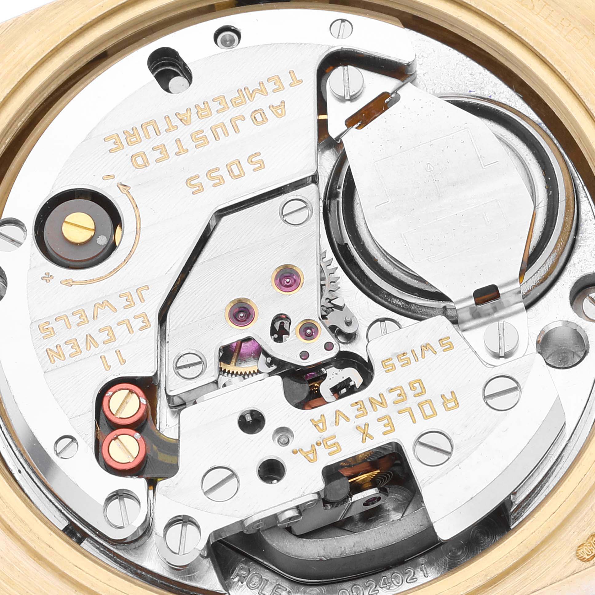 This image shows a close-up view of the movement inside a Rolex Oysterquartz 19018 Men's Yellow Gold Champagne Dial 19018 Men's Yellow Gold Champagne Dial watch.