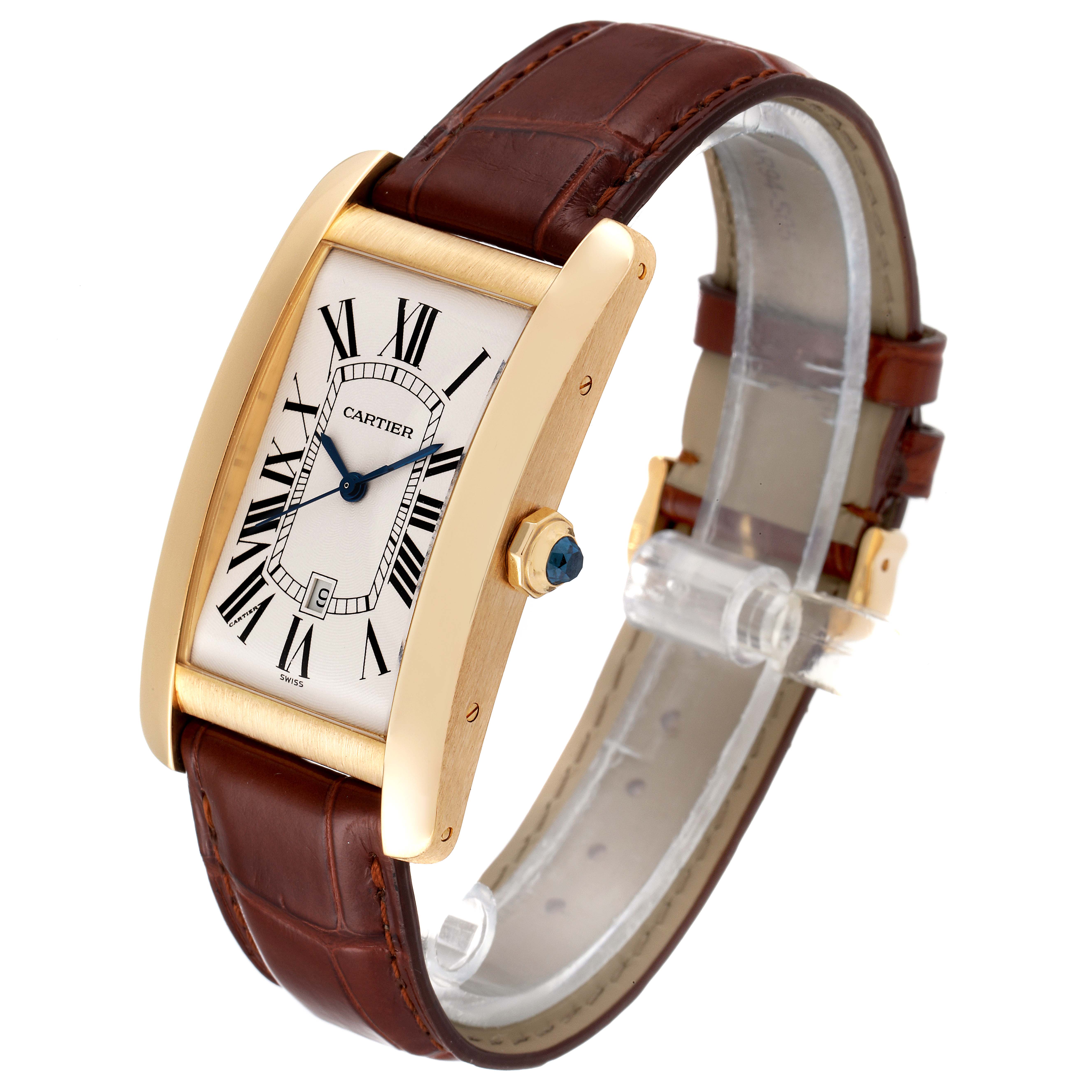 The Cartier Tank Americaine W2603156 Men's Yellow Gold Silver Dial W2603156 Men's Yellow Gold Silver Dial watch is shown from a three-quarter angle, displaying its face, bezel, crown, and leather strap.