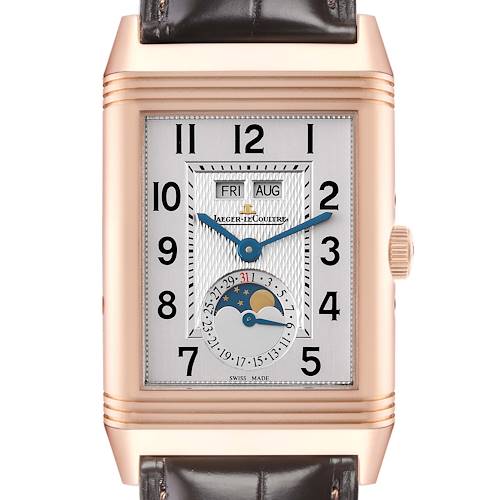 The Jaeger-LeCoultre Reverso watch is shown from the front, highlighting the dial, hands, and moon phase complication.