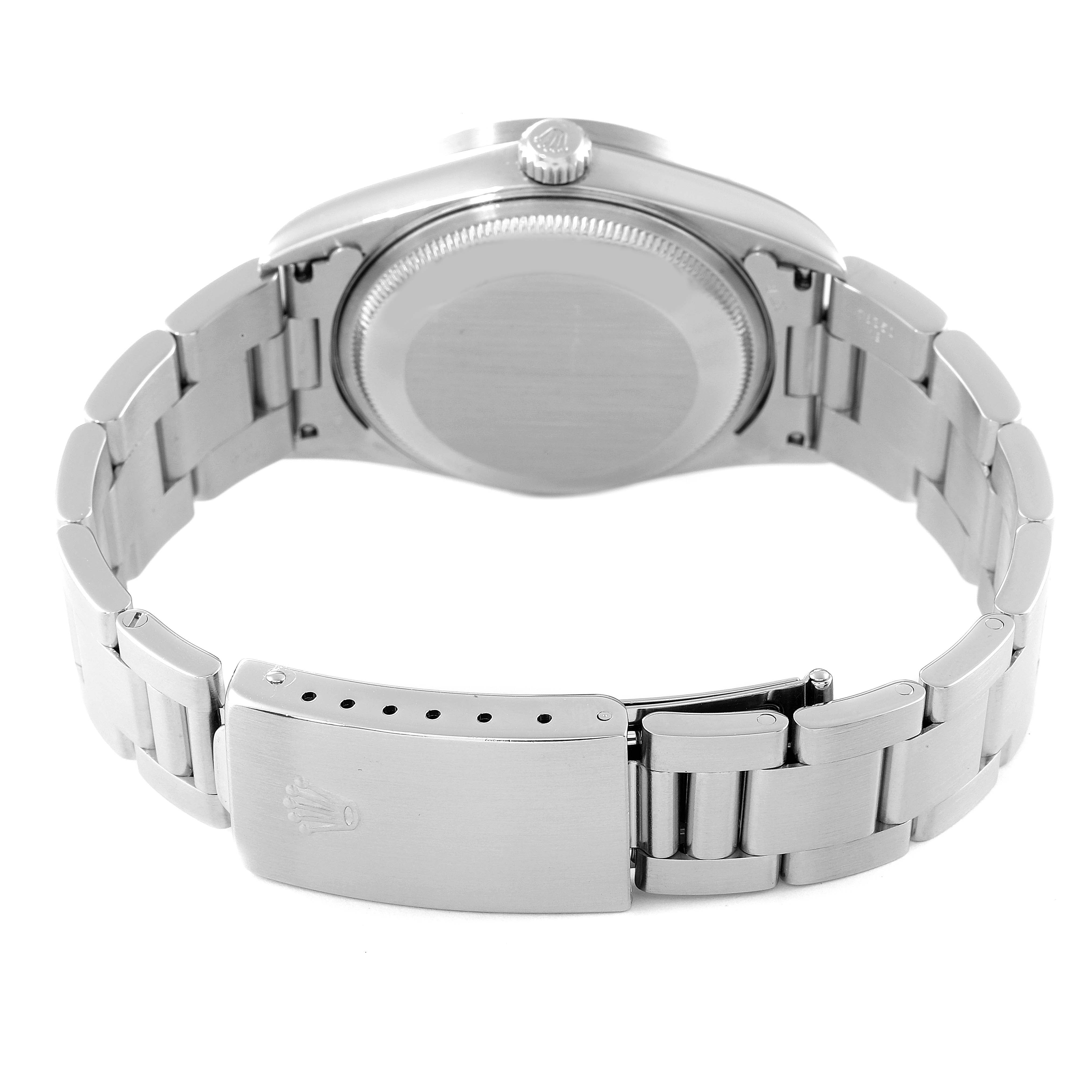 This image shows the back view of the Rolex Date 15210 Men's Stainless Steel Blue Dial 15210 Men's Stainless Steel Blue Dial model watch, displaying its case back and metal bracelet with clasp.