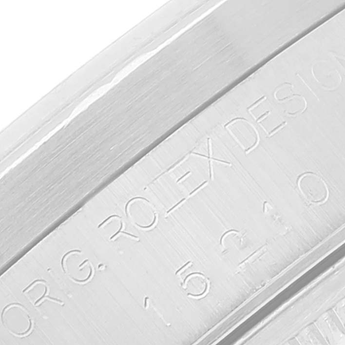 This is a close-up of the serial number engraving on a Rolex Date 15210 Men's Stainless Steel Blue Dial 15210 Men's Stainless Steel Blue Dial model watch.