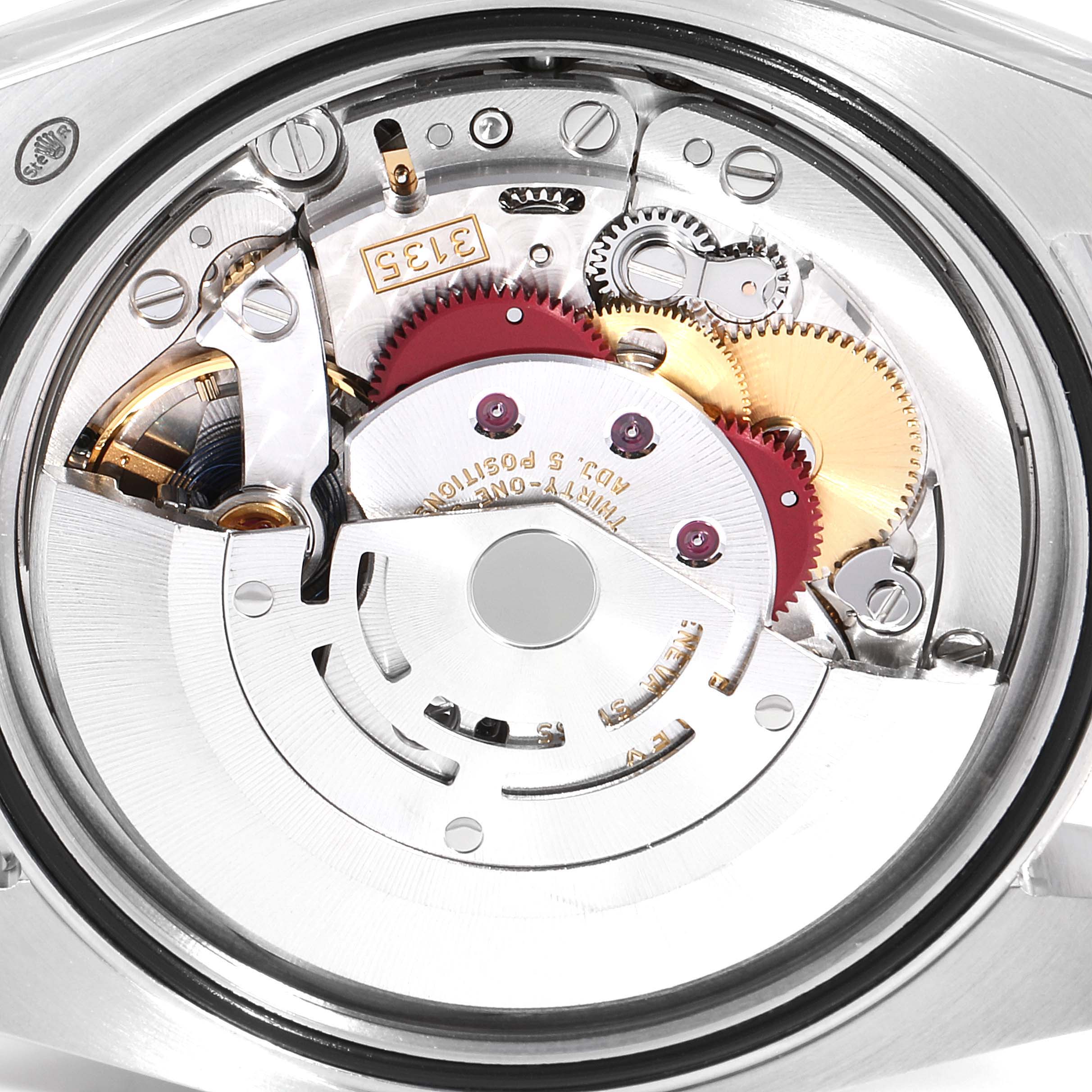 This image shows the internal movement mechanism of a Rolex Datejust 116234 Men's Stainless Steel Mother of Pearl Dial 116234 Men's Stainless Steel Mother of Pearl Dial watch, viewed from the back.