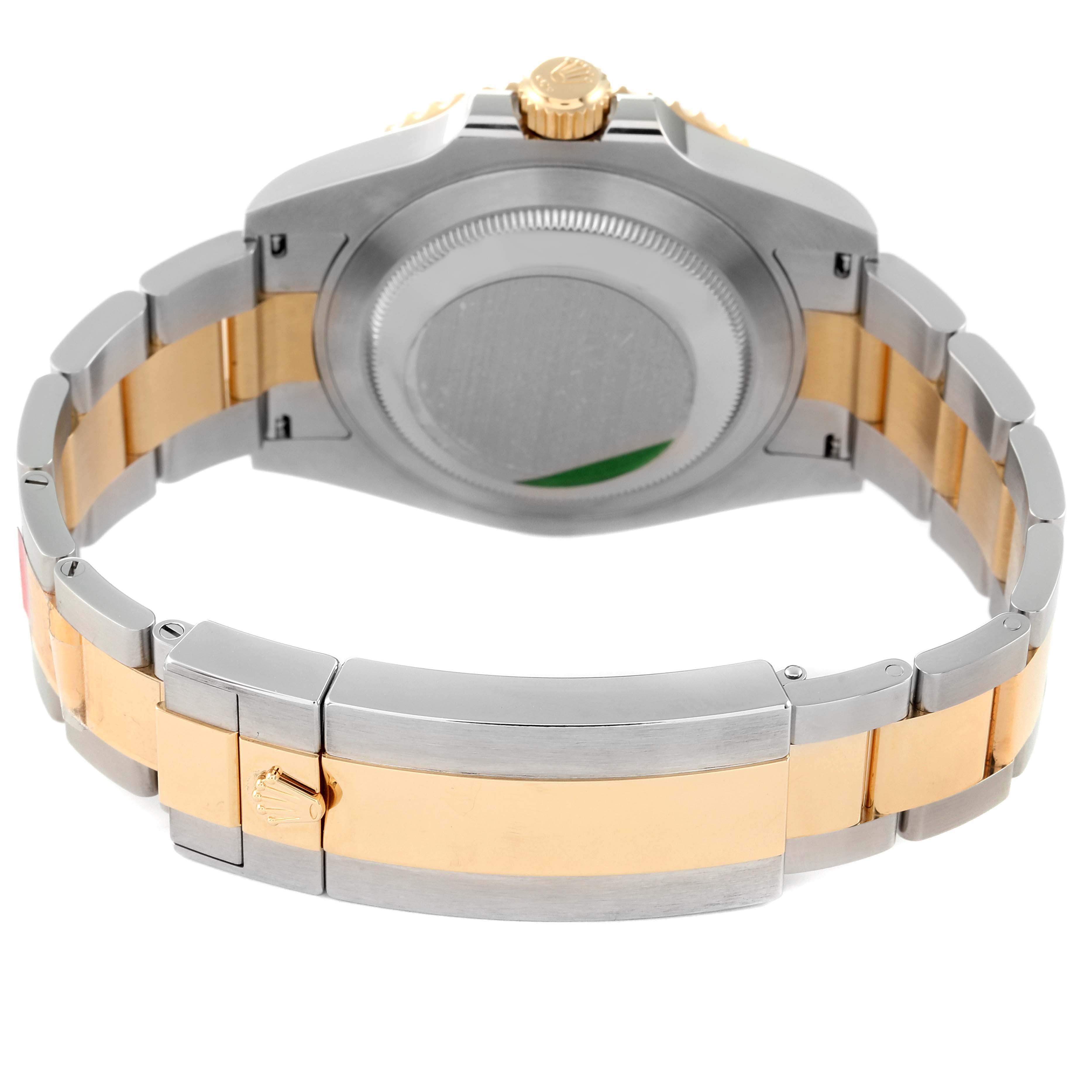 This image shows the back view of a Rolex Submariner 126613 Men's Steel and Gold (two tone) Black Dial 126613 Men's Steel and Gold (two tone) Black Dial, including the case back, crown, and the bracelet clasp.