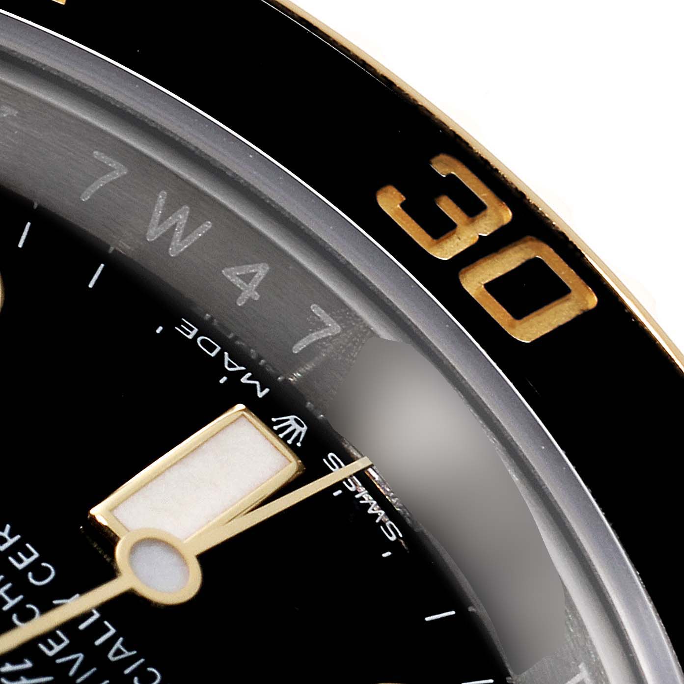The image shows a close-up angle of the dial and bezel, specifically focusing on the "30" mark, of the Rolex Submariner 126613 Men's Steel and Gold (two tone) Black Dial 126613 Men's Steel and Gold (two tone) Black Dial watch.