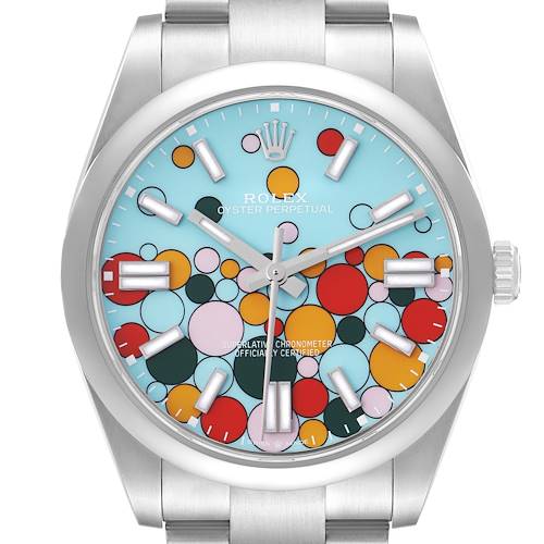 The Rolex Oyster Perpetual 124300 Men's Stainless Steel Blue Dial watch is shown from a front angle, highlighting its colorful dial and silver case.