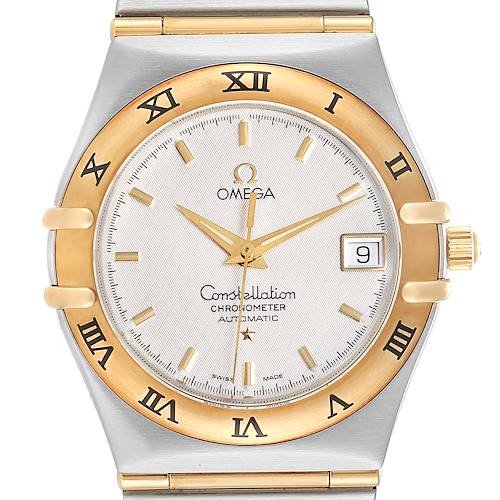 The image shows a front view of an Omega Constellation 1202.30.00 Men's Steel and Gold (two tone) Silver Dial 1202.30.00 Men's Steel and Gold (two tone) Silver Dial watch, featuring a gold and silver bezel, Roman numeral markers, and a date display.