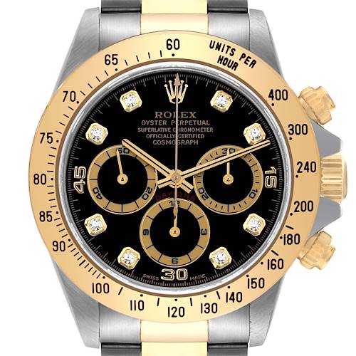 The image shows a front-on view of a Rolex Daytona 16523 Men's Steel and Gold (two tone) Black Dial 16523 Men's Steel and Gold (two tone) Black Dial watch, highlighting its dial, bezel, and chronograph sub-dials.