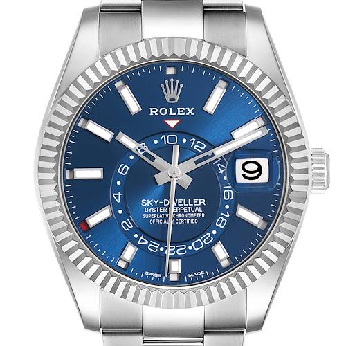 The Rolex Sky-Dweller 326934 Men's Stainless Steel Blue Dial watch is shown from the front, highlighting the blue dial, date, and fluted bezel.