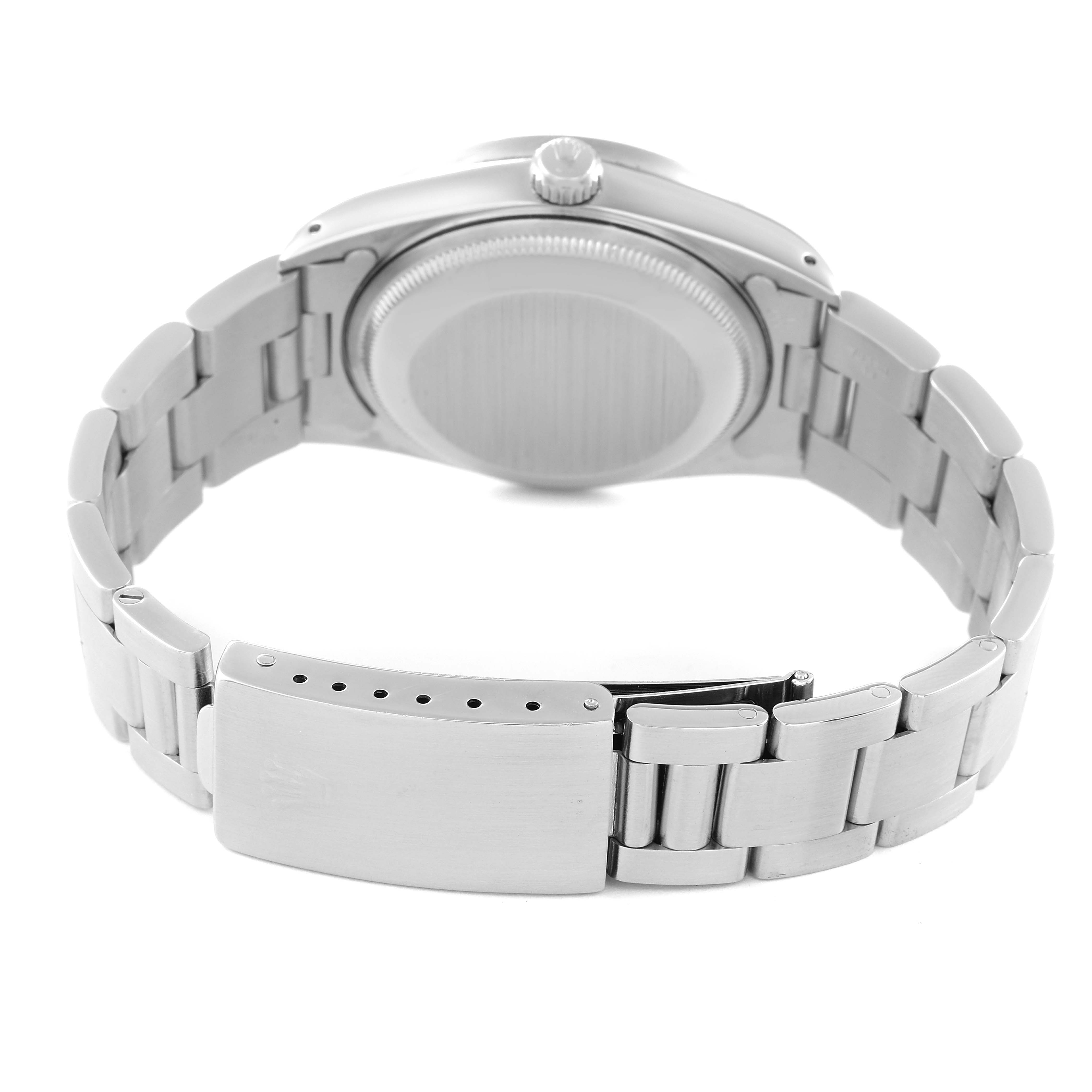 The image shows the back and band of a Rolex Date 15210 Men's Stainless Steel Silver Dial 15210 Men's Stainless Steel Silver Dial model watch, emphasizing the clasp and case back.