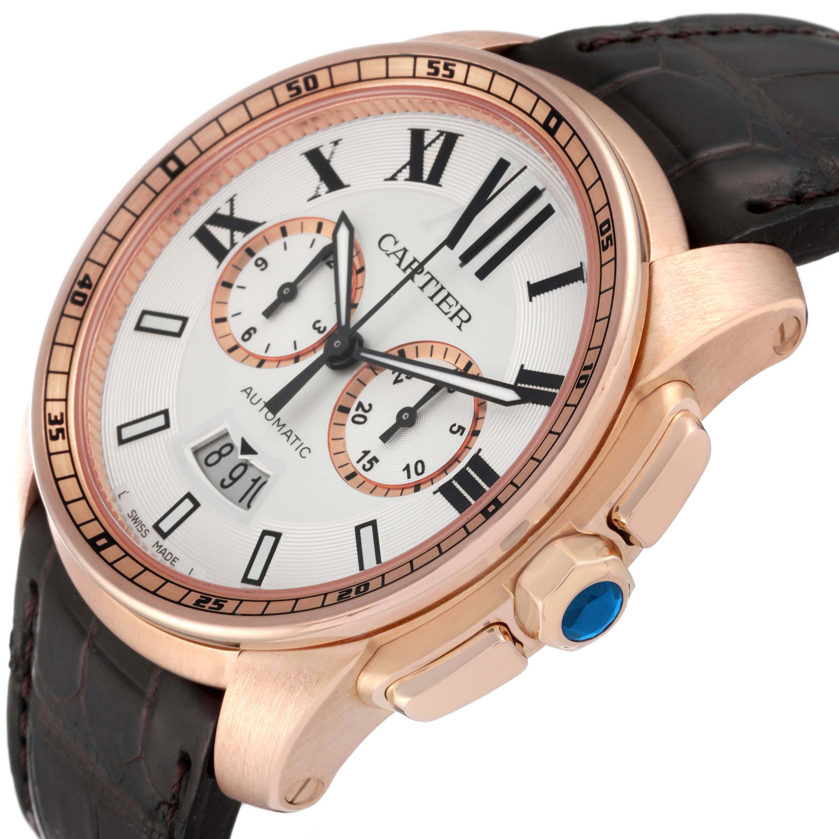The Calibre de Cartier watch is shown at a three-quarter angle highlighting the dial, crown, and strap.