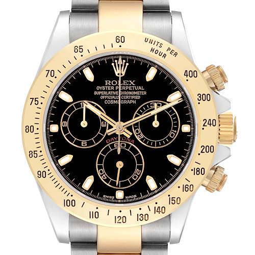 The image shows a frontal view of the Rolex Daytona model 116523, highlighting the bezel, crown, sub-dials, and part of the bracelet.