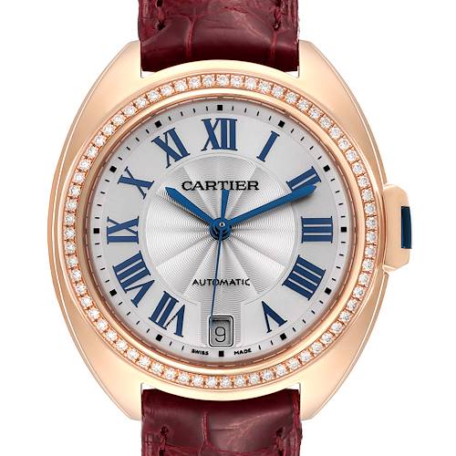 The image shows a front view of a Cartier Cle WJCL0013 Women's Rose Gold Blue Dial WJCL0013 Women's Rose Gold Blue Dial model watch, highlighting the dial, bezel, hands, and partially the leather strap.