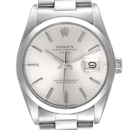 The image shows a front view of the dial and a portion of the bracelet of a Rolex Oyster Perpetual Date model.