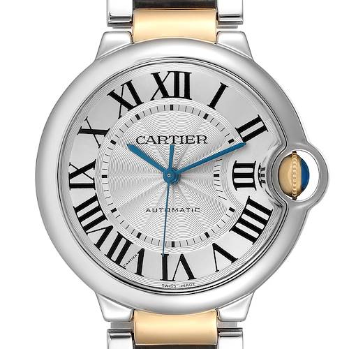 The Cartier Ballon Bleu model W2BB0012 watch is shown from a front angle, featuring its dial with Roman numerals, blue hands, and crown with a blue cabochon.