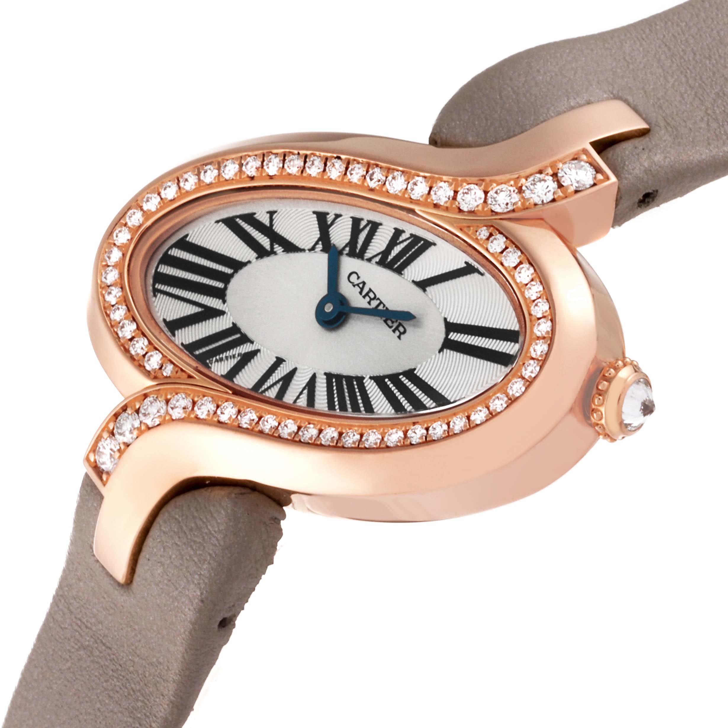 The image shows a close-up side angle of the Cartier Delices WG800013 Women's Rose Gold Silver Dial WG800013 Women's Rose Gold Silver Dial watch, highlighting the diamond-encrusted bezel, face, and crown.