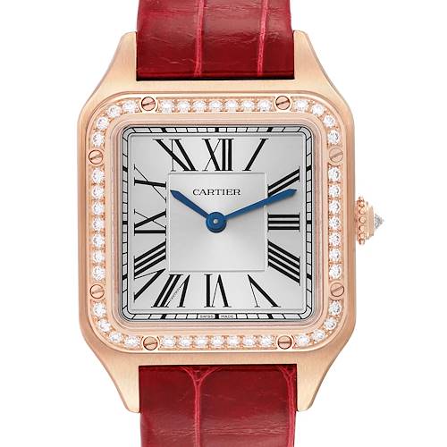 The image shows a straight-on view of a Cartier Santos WJSA0017 Women's Rose Gold Silver Dial WJSA0017 Women's Rose Gold Silver Dial watch featuring a square face, Roman numerals, and a red leather strap.