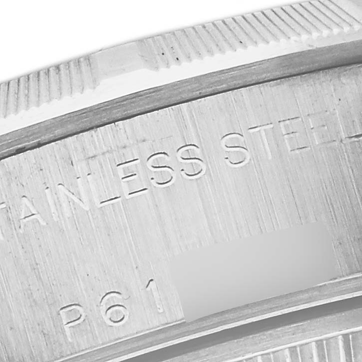 This close-up image shows the engraved stainless steel caseback of a Rolex Date 79190 Women's Stainless Steel White Dial 79190 Women's Stainless Steel White Dial model watch.