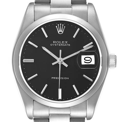 The Rolex Vintage Collection model 6694 is shown from a frontal angle, displaying its black dial, silver markers, hands, crown, and stainless steel bracelet.