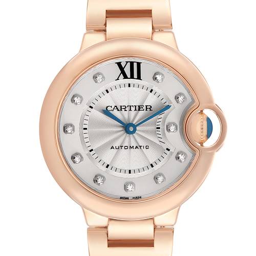 The image shows a front view of the Cartier Ballon Bleu model WE902039, highlighting its round face, rose gold case, and diamond hour markers.