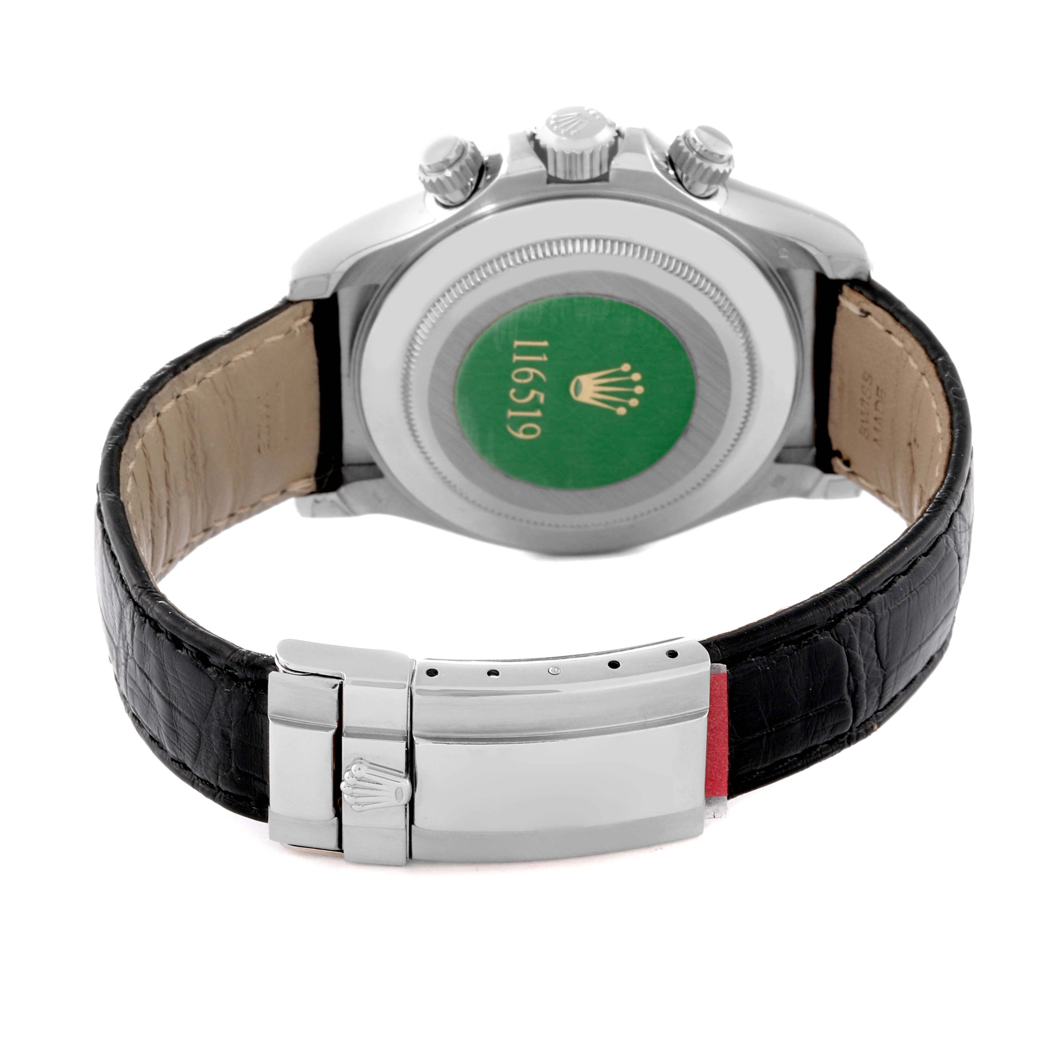 This image shows the back of the Rolex Daytona 116519 Men's White Gold Black Dial 116519 Men's White Gold Black Dial watch and its leather strap with a close-up of the clasp and caseback.