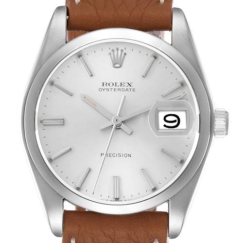 The image shows a frontal view of the Rolex Vintage Collection Men's watch model 6694, highlighting the dial, crown, and date window with a brown leather strap.