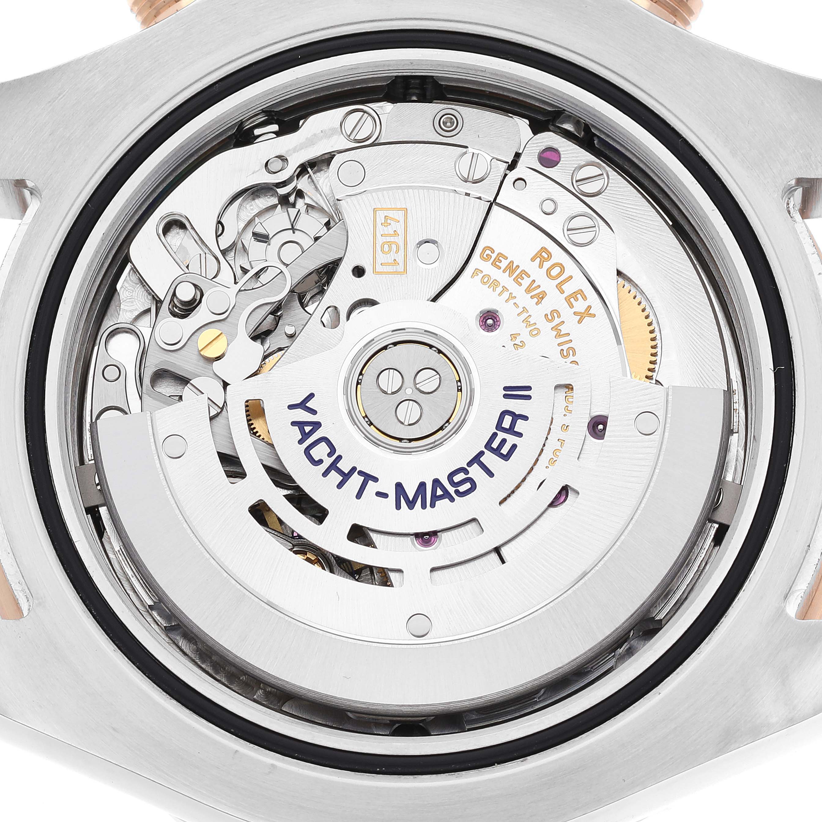 This image shows the movement and internal mechanics of a Rolex Yacht-Master 116681 Men's Steel and Gold (two tone) White Dial 116681 Men's Steel and Gold (two tone) White Dial II watch from a back angle.