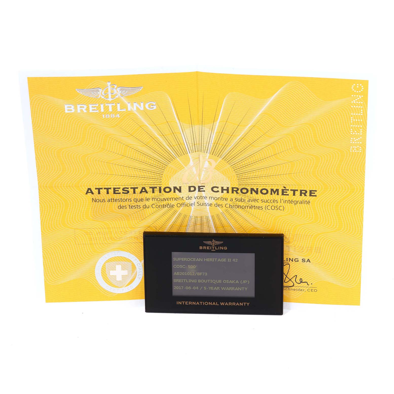 The image shows a warranty card and a chronometer certificate for the Breitling Superocean AB2010161C1A1 Men's Stainless Steel Black Dial AB2010161C1A1 Men's Stainless Steel Black Dial model.
