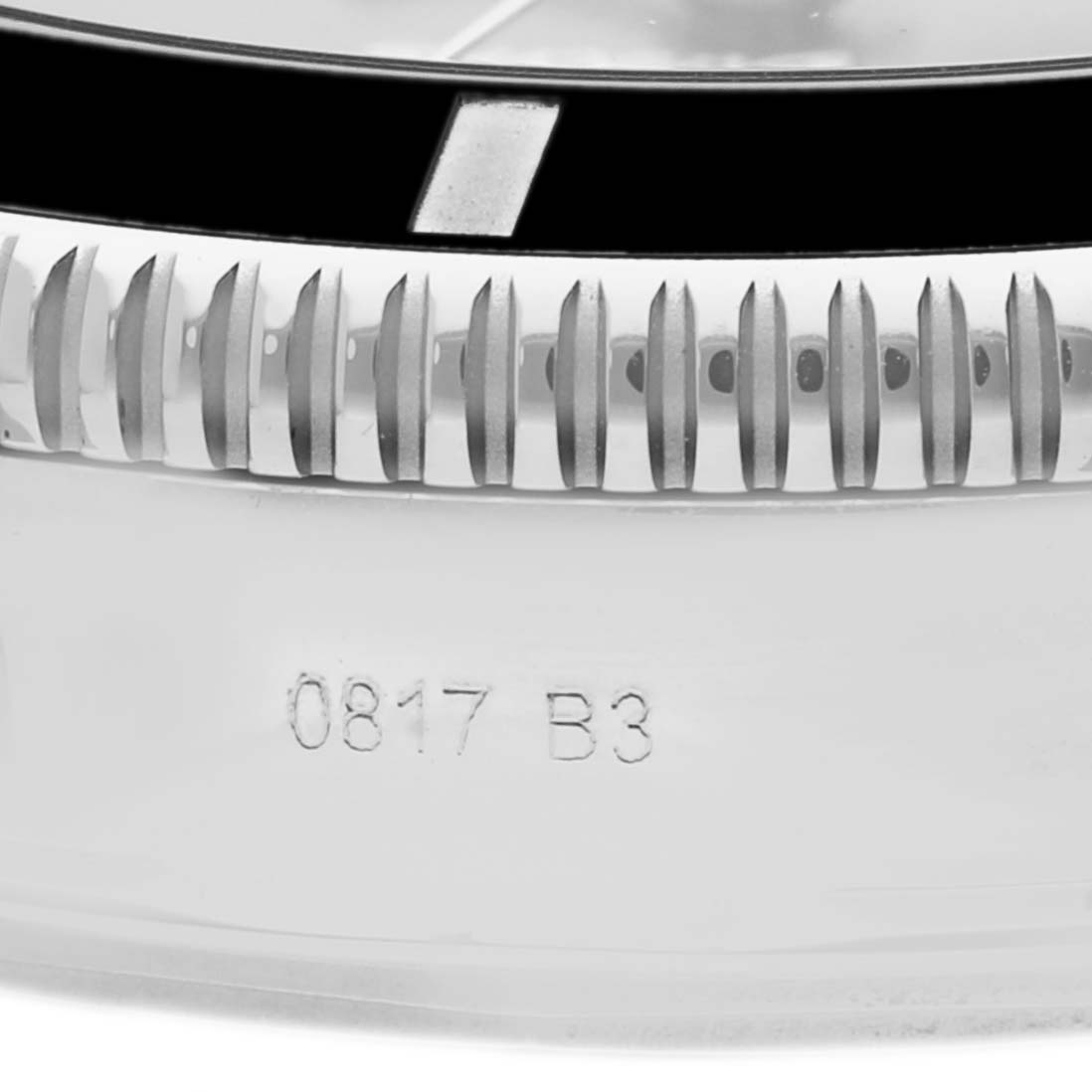 The image shows a close-up of the bezel and part of the case back of a Breitling Superocean AB2010161C1A1 Men's Stainless Steel Black Dial AB2010161C1A1 Men's Stainless Steel Black Dial watch with engraved numbers "0817 B3."