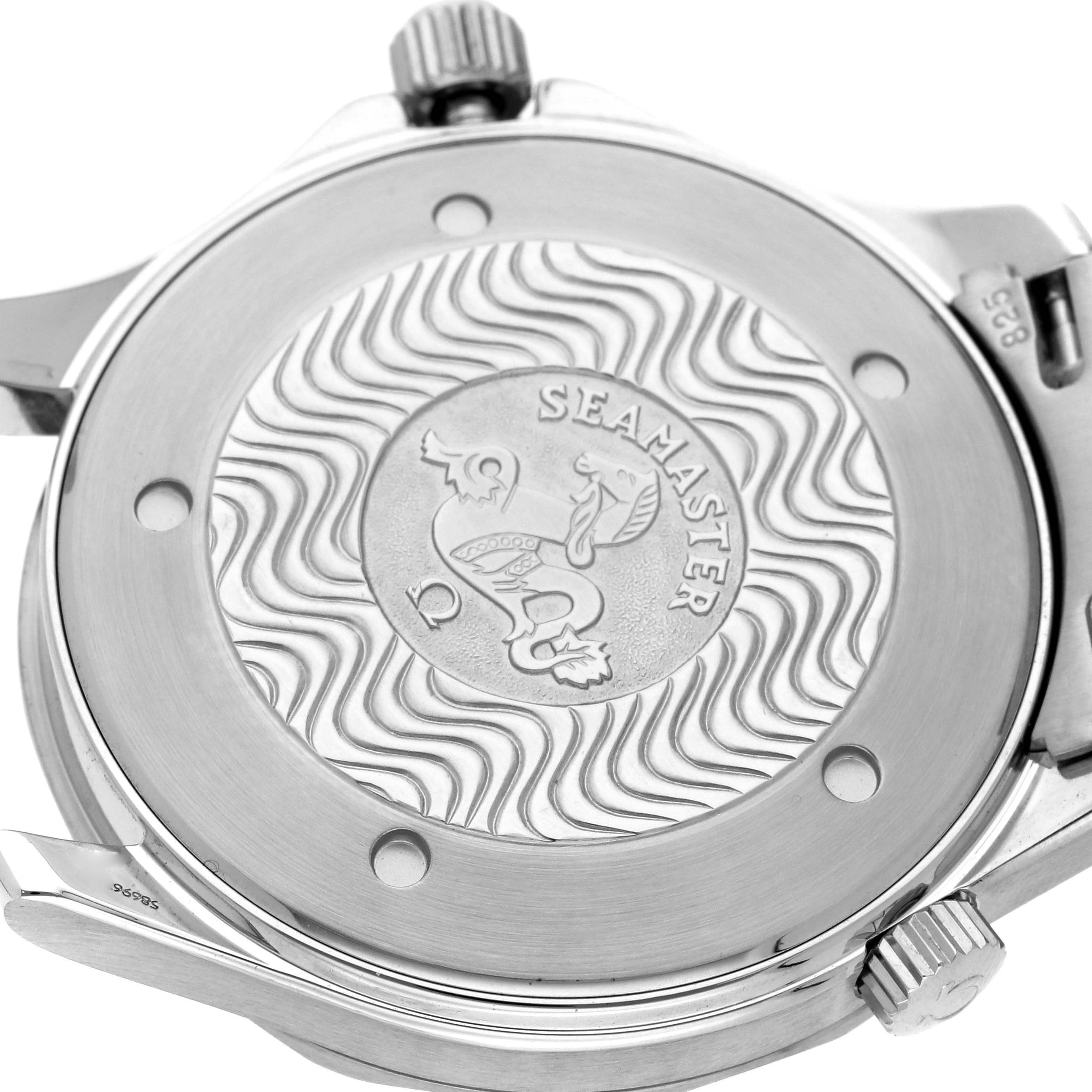 The image shows the back case of an Omega Seamaster 2541.80.00 Men's Stainless Steel Blue Dial 2541.80.00 Men's Stainless Steel Blue Dial watch with its emblem and wave pattern, including the crown and lugs.